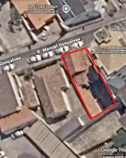 Casa com lote para comércio no Centro
